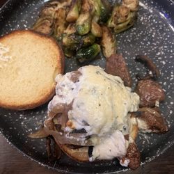 Blue Dog Saloon and Restaurant - Black &Blue Filet with artichokes.