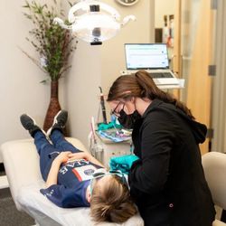 Great Smiles - Staff and patient in procedure area