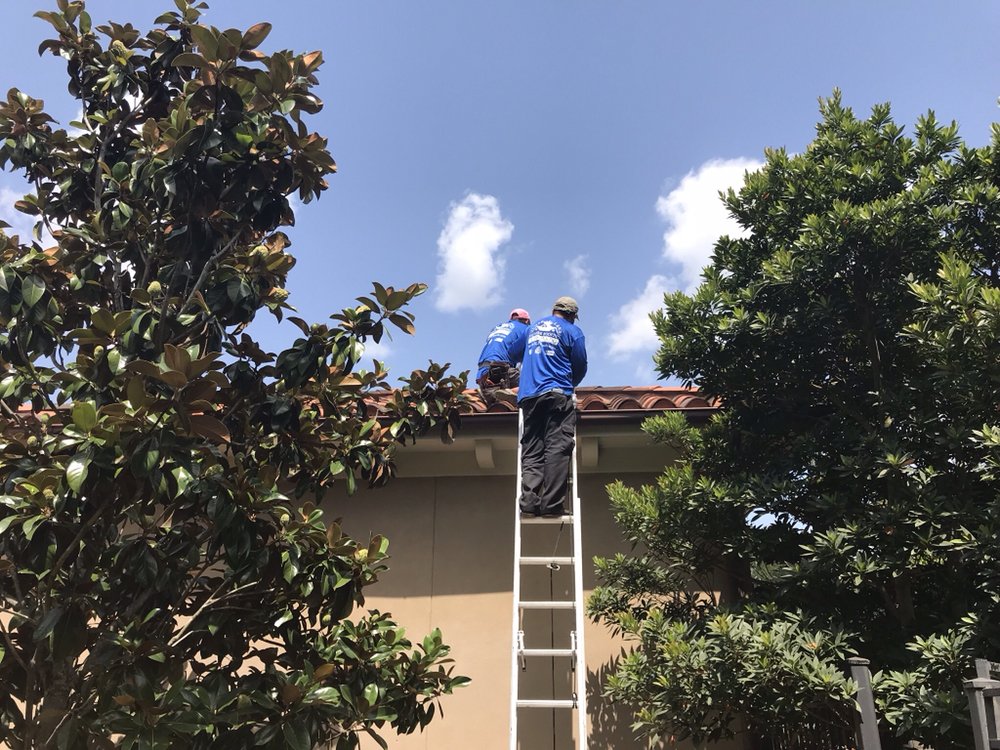 Slide of The Woodlands Premier Roofing