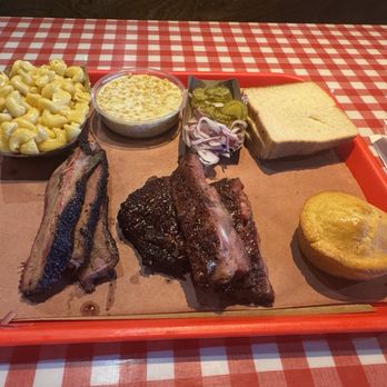 Terry Black's Barbecue - 1/2 lb brisket 1/2 lb pork ribs 1 cornbread 1 pint Mac & cheese Small serving creamed corn - Barbeque Near Me - Austin, Texas Terry Black's Barbecue - 1/2 lb brisket 1/2 lb pork ribs 1 cornbread 1 pint Mac & cheese Small serving creamed corn - Barbeque Near Me - Austin, Texas