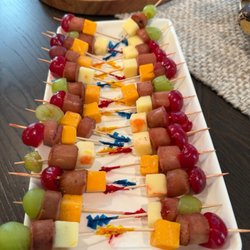 Sausage, fruit and cheese skewers