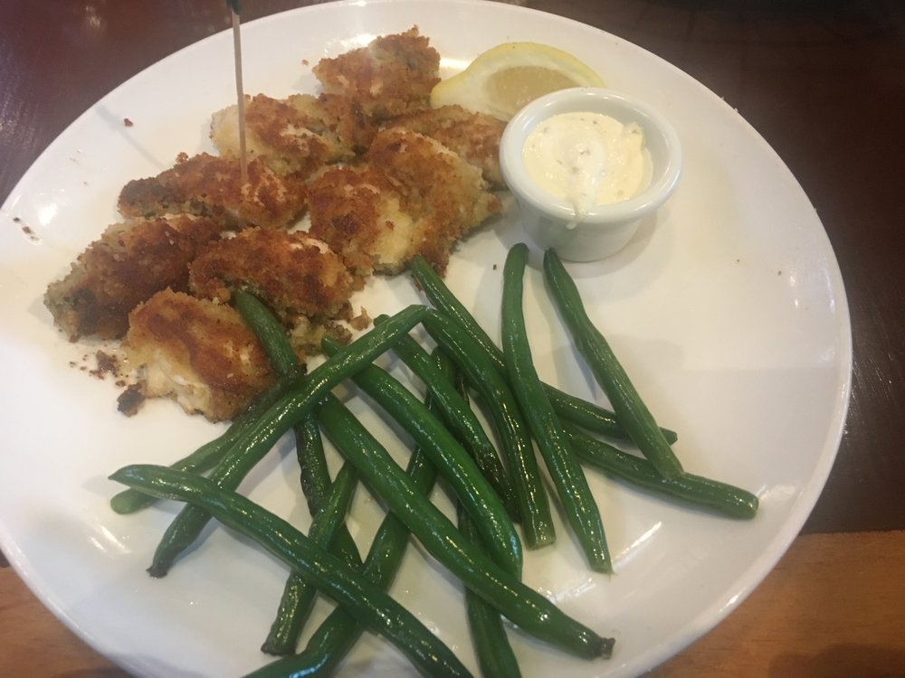 Pan fried oysters lightly and nicely preparedthe cook must love food