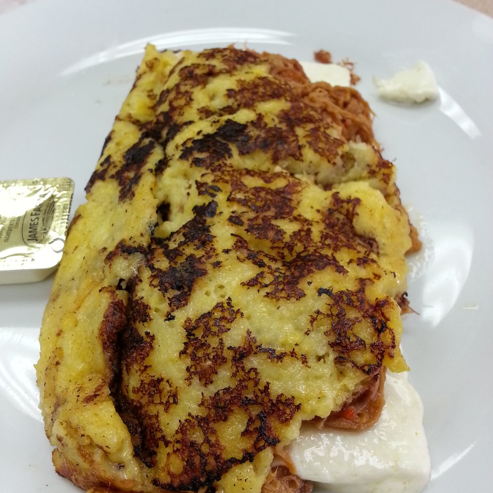 a meat filled corn cake
