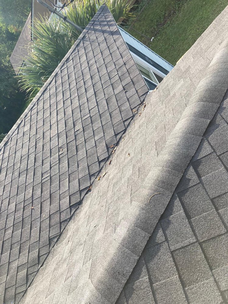 Slide of Payless Roofing