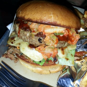 Grill 'Em All - Tokkaebi- kimchi, 1/2lb patty, korean pancake (pageon), bulgolgi, lettuce. House made sriracha, Gochu-jang sauce - Burgers Near Me - Long Beach, California Grill 'Em All - Tokkaebi- kimchi, 1/2lb patty, korean pancake (pageon), bulgolgi, lettuce. House made sriracha, Gochu-jang sauce - Burgers Near Me - Long Beach, California