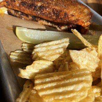 The Record - 1/2 of our yummy grilled cheese with mustard on Local sourdough w/chips and pickle. - Pubs Near Me - Point Arena, California