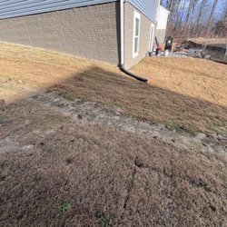 Mike Tyndall's Custom Decks and Privacy Fences - Yard prior to work as you can see there is sod dormant, but it's sod