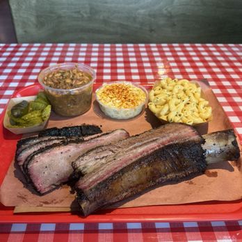 Terry Black's Barbecue - 1lb of brisket, beef rib, cream corn, beans, and Mac and cheese. - Barbeque Near Me - New Braunfels, Texas Terry Black's Barbecue - 1lb of brisket, beef rib, cream corn, beans, and Mac and cheese. - Barbeque Near Me - New Braunfels, Texas