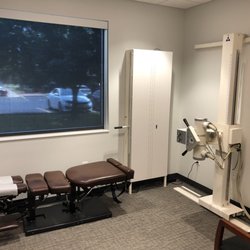 Family Back & Neck Care Centre - Examination room with Digital X-Ray