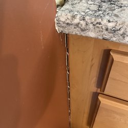 Lowe's Home Improvement - Install company told us the problem was the weight of the countertop caused separation. We disagreed, as the countertop was in the wall.