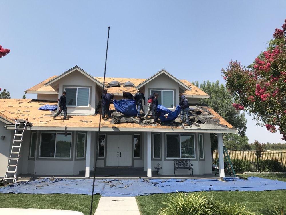 Slide of T&K Roofing