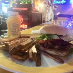 AJ's Hotel Bar and Grill - The Pork Belly BELT - pork belly, bacon, egg, lettuce, and tomato. So good I had it again on my second visit.