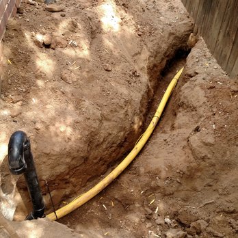 Curtis Plumbing - New gas line installed along outside edge of roof eve at customer's request - Plumbing Near Me - Tucson, Arizona