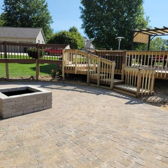 JWM Decks and Patios - This is a 32×32 paver patio with a firepit. This started as a pool deck. - Masonry/Concrete Near Me JWM Decks and Patios - This is a 32×32 paver patio with a firepit. This started as a pool deck. - Masonry/Concrete Near Me