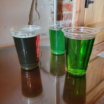 Home Brew Taproom & Tunes - three different colors of beer - Juice Bars & Smoothies Near Me - Monroe, North Carolina