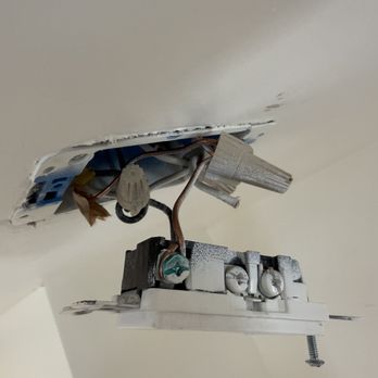 Better Together Builders - White electrical wire is damaged and not fully connected, creating a potential safety hazard. - General Contractors Near Me - Los Angeles, California