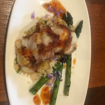 Brix - The special. Fish wrapped in bacon, on risotto with asparagus. - New American Near Me - Napa, California