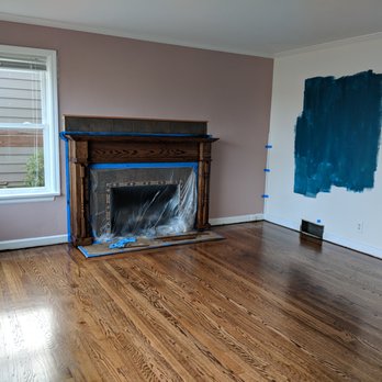 Henry Hardwood Floor Service - finished floors and fireplace - Flooring Near Me - Seattle, Washington