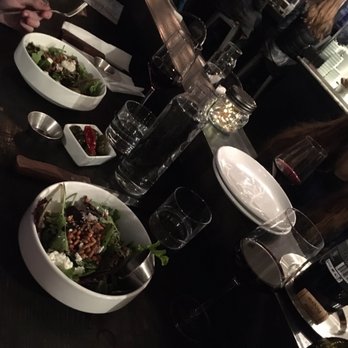 Pizzicletta - Split salad and wine with warmed olives - Pizza Near Me - Flagstaff, Arizona