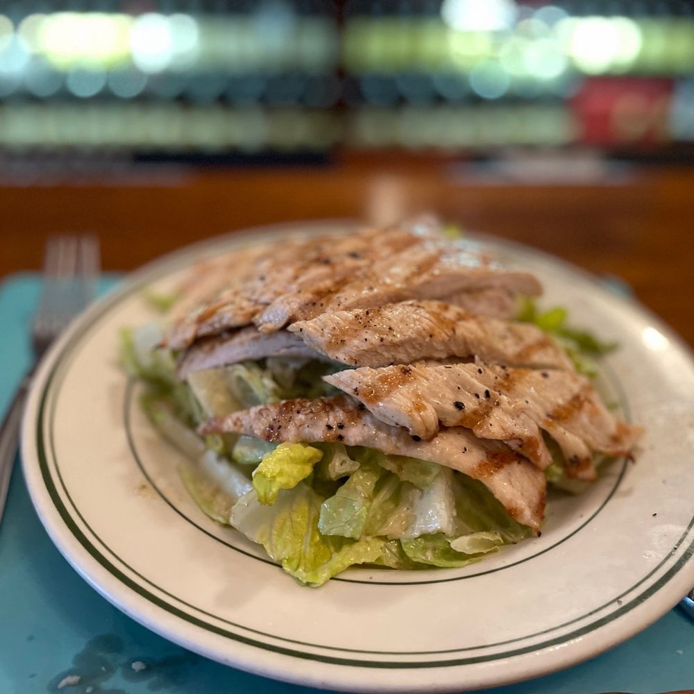 La Fiamma - a plate of chicken and lettuce - Italian Near Me - Harrison, New Jersey La Fiamma - a plate of chicken and lettuce - Italian Near Me - Harrison, New Jersey