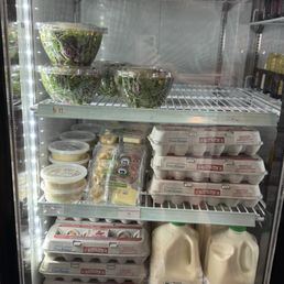 Cooler with Story eggs, milk, grab and go options Cooler with Story eggs, milk, grab and go options