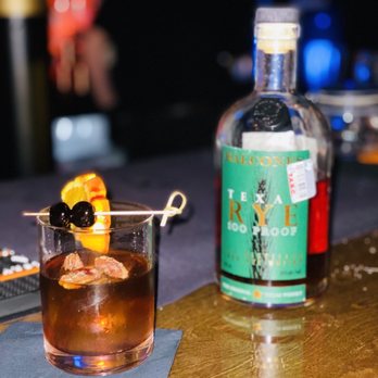 The Gramercy - a glass of alcohol and a bottle of liquor - Lounges Near Me - Lakeway, Texas The Gramercy - a glass of alcohol and a bottle of liquor - Lounges Near Me - Lakeway, Texas