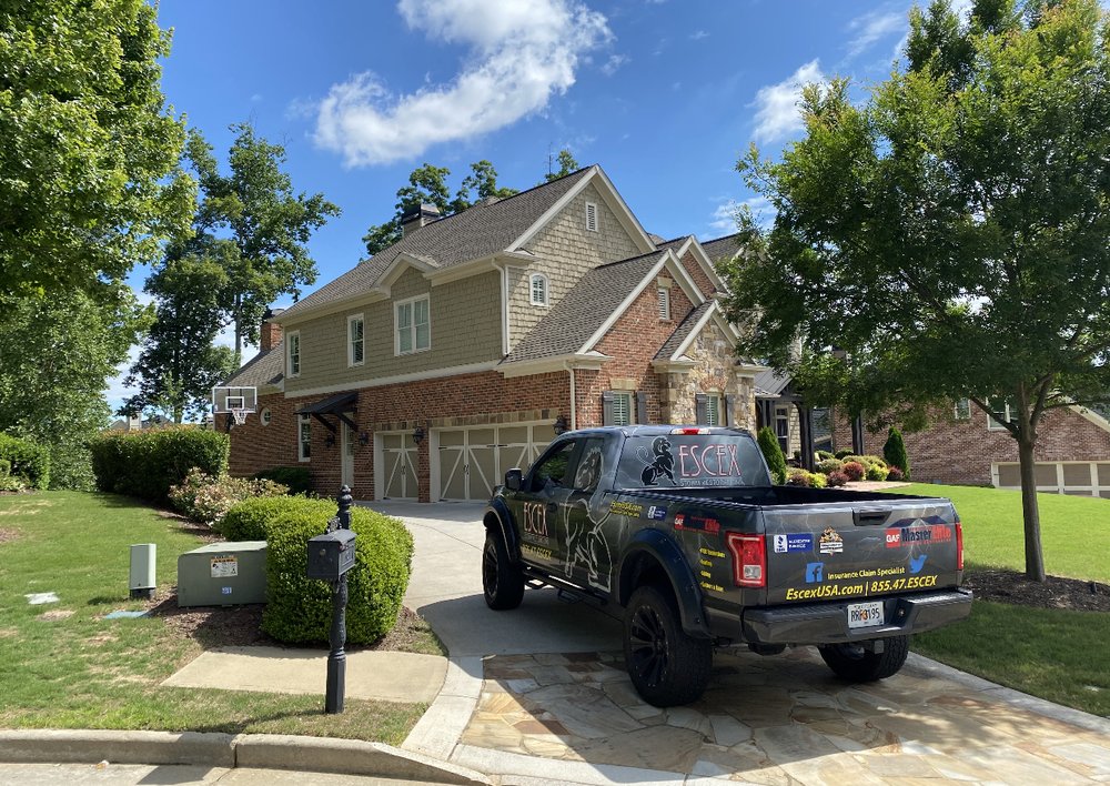 Slide of Escex Roofing and Restorations