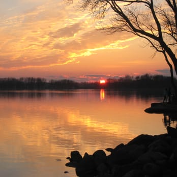 Sunset Bar & Grill - a view of a lake at sunset - American Near Me - Fort Atkinson, Wisconsin Sunset Bar & Grill - a view of a lake at sunset - American Near Me - Fort Atkinson, Wisconsin