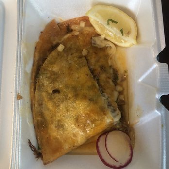 Fuego Cravings - Birria quesadilla. It's cut into 3 pieces. Already ate one before I remembered to take a picture. - Mexican Near Me - Rancho Cucamonga, California