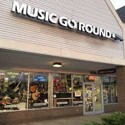 Music Go Round - We got our new sign....ushering in the new millenium!