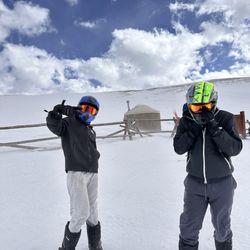 Nova Guides - Bryce and Hayden taking selfies at the windy top.