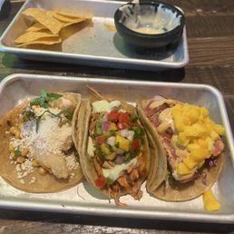 Chips & Queso, Ahi Tuna Taco, Shrimp & Street Corn Taco, and Chicken Tinga Taco Chips & Queso, Ahi Tuna Taco, Shrimp & Street Corn Taco, and Chicken Tinga Taco