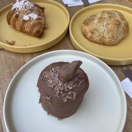 Almond croissant, butter scone, chocolate bunny cake Almond croissant, butter scone, chocolate bunny cake