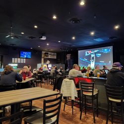 The Pointe Grill & Bar - March Madness human-size TV...like you are court-side!