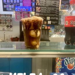 Black cow- vanilla ice cream with chocolate syrup and coke Black cow- vanilla ice cream with chocolate syrup and coke