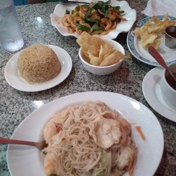 Iron Wok - Manila pancit in the front, spicy Thai basil shrimp in the back. - Chinese Near Me - Bryson City, North Carolina Iron Wok - Manila pancit in the front, spicy Thai basil shrimp in the back. - Chinese Near Me - Bryson City, North Carolina