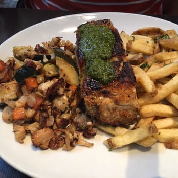 Ollo - Sea Bass with fries and roasted vegetables - New American Near Me - Malibu, California Ollo - Sea Bass with fries and roasted vegetables - New American Near Me - Malibu, California
