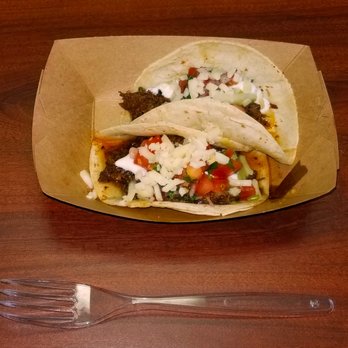 Guacamoli - Judging from the diminutive size of their "Street Tacos" (2 / $5.00) these truck operators must be from an area with very small streets! - Caterers Near Me - Orlando, Florida