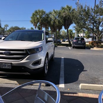 Rumba Cuban Cafe - Sidewalk dining facing the parking lot. - Cuban Near Me - Naples, Florida Rumba Cuban Cafe - Sidewalk dining facing the parking lot. - Cuban Near Me - Naples, Florida