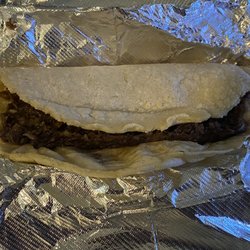 Noe's Tacos - Barbacoa (slow cooked beef) on homemade corn tortillas taco.