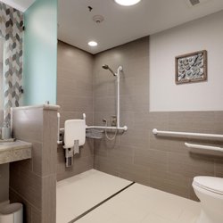 Silverleaf Eldercare - Modern upgrades for ease of mobility and autonomy in our gorgeous bathrooms.