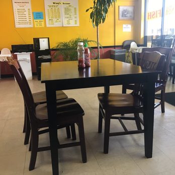 Wings Avenue - 5 tables in here each with 4 chairs - New American Near Me - Lawrenceville, Georgia Wings Avenue - 5 tables in here each with 4 chairs - New American Near Me - Lawrenceville, Georgia