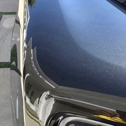 Protek Dent & Scratch Removal - 2027 Rolls-Royce Cullinan Black badge after dent removed.