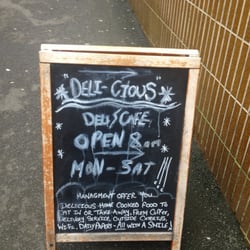 Deli-cious Cafe - Their super sweetie sign that tells you how lovely they are. Great genuine service.
