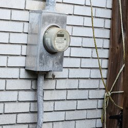 Seaside Electric - The service outside the house
