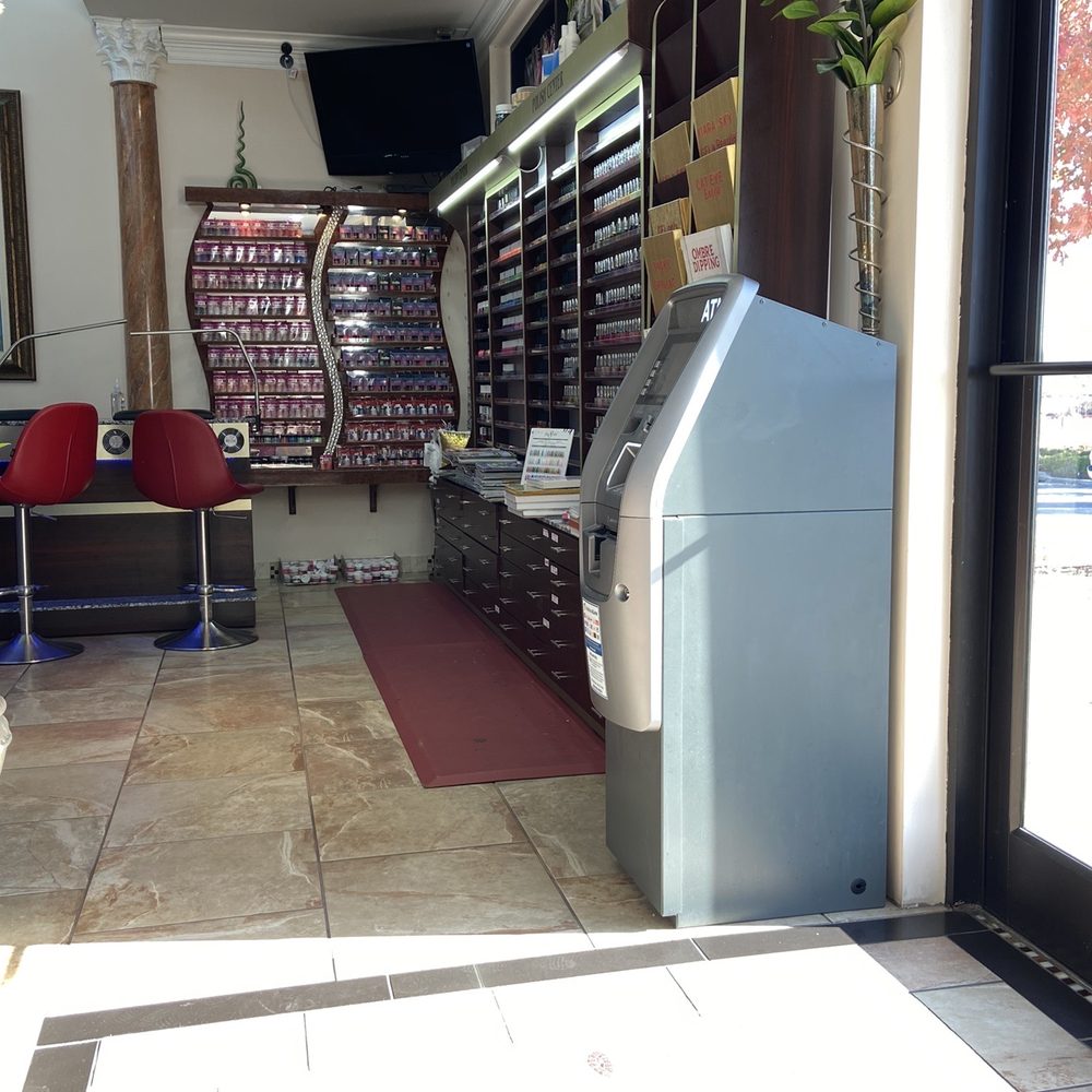 Sapphire Nails & Spa - Waiting area with huge nail polish area - Day Spas Near Me - Hoover, Alabama