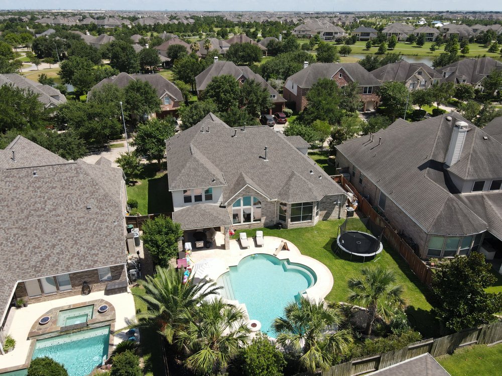 Slide of Moss Roofing Houston