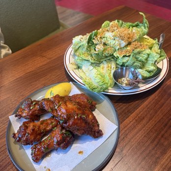Folks Pizzeria - Wings (bottom), Caesar salad (top) - Pizza Near Me - Culver City, California Folks Pizzeria - Wings (bottom), Caesar salad (top) - Pizza Near Me - Culver City, California