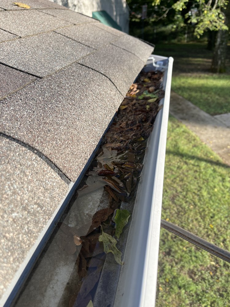 Slide of Marcus Gutters Cleaning