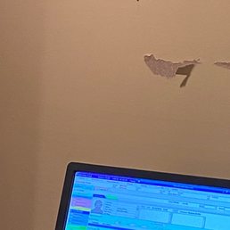 Wall behind door in exam room